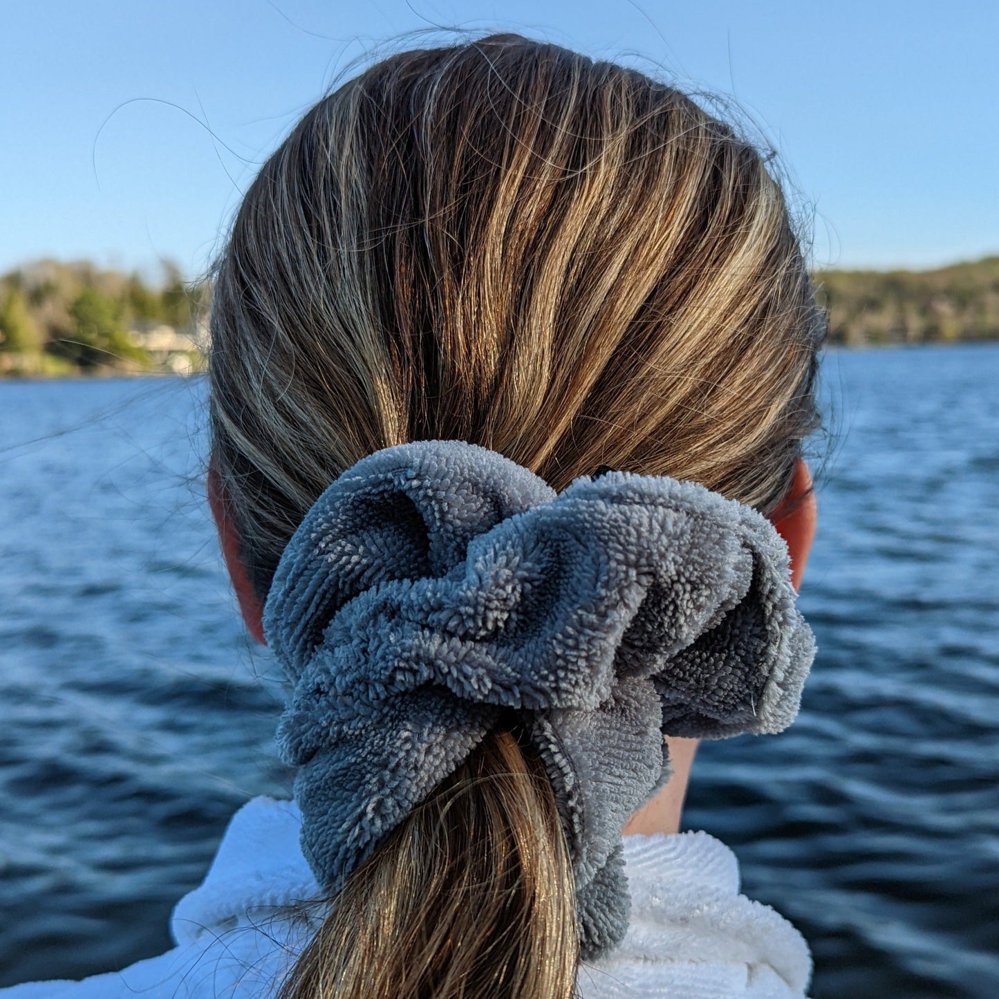 Grey towel scrunchie in a pony tail, super luxe