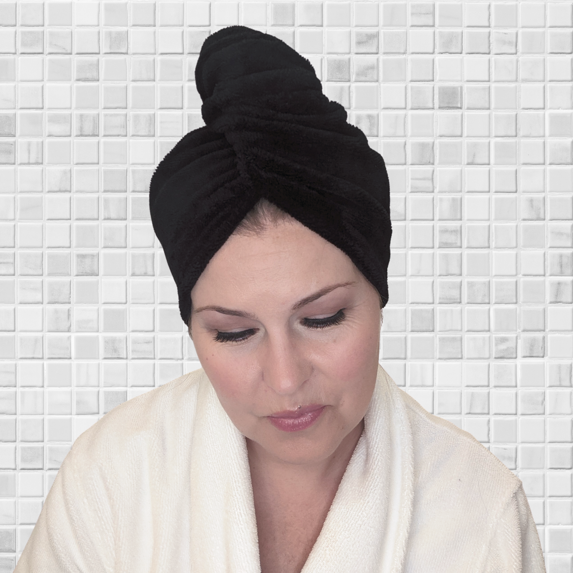 woman wearing black microfiber cotton bamboo hair drying towel perfect for spa travel or at home 