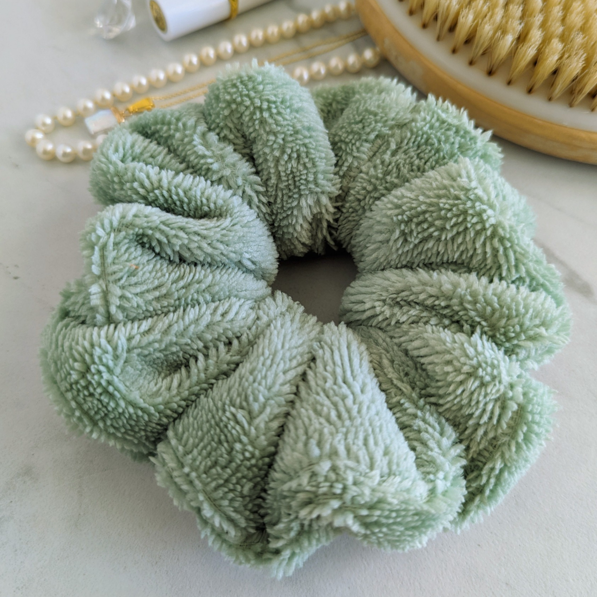 Sage green Microfiber towel scrunchie, absorbs water post shower, avoid dripping hair, limit heat exposure and made out of luxe microfiber